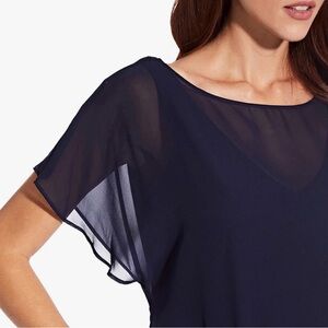 Delicate sheer blue blouse